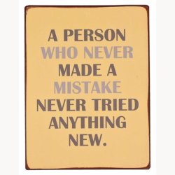 Sign - A person who never made a mistake, never tried anything new