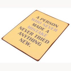 Sign - A person who never made a mistake, never tried anything new