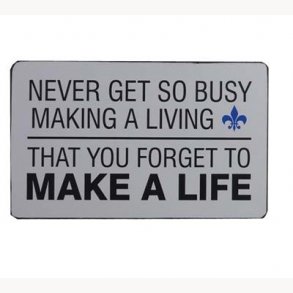Sign - Never get so busy making a living...