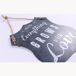 Skilt - Everything grows with love