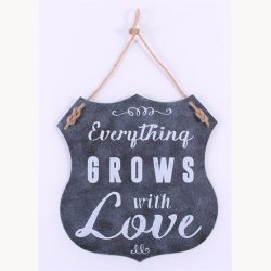 Skilt - Everything grows with love