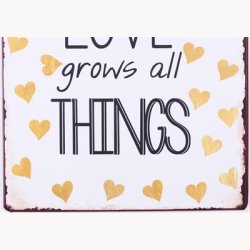 Skilt - A mother's love grows all things