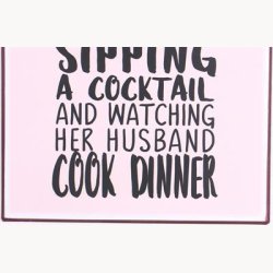 Skilt - A woman's place is in the kitchen...